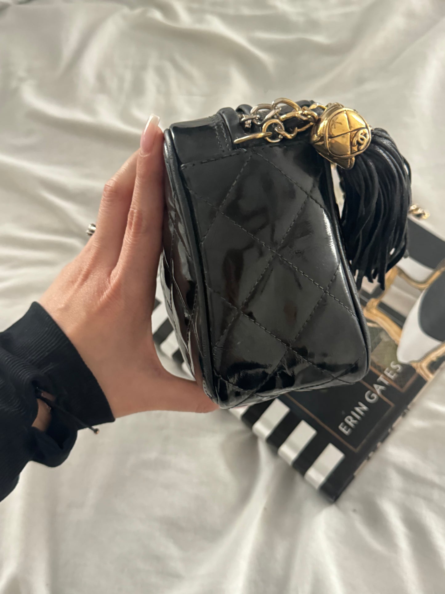 PRE-OWNED CHANEL VINTAGE BLACK PATENT SMALL CC TASSEL CAMERA BAG